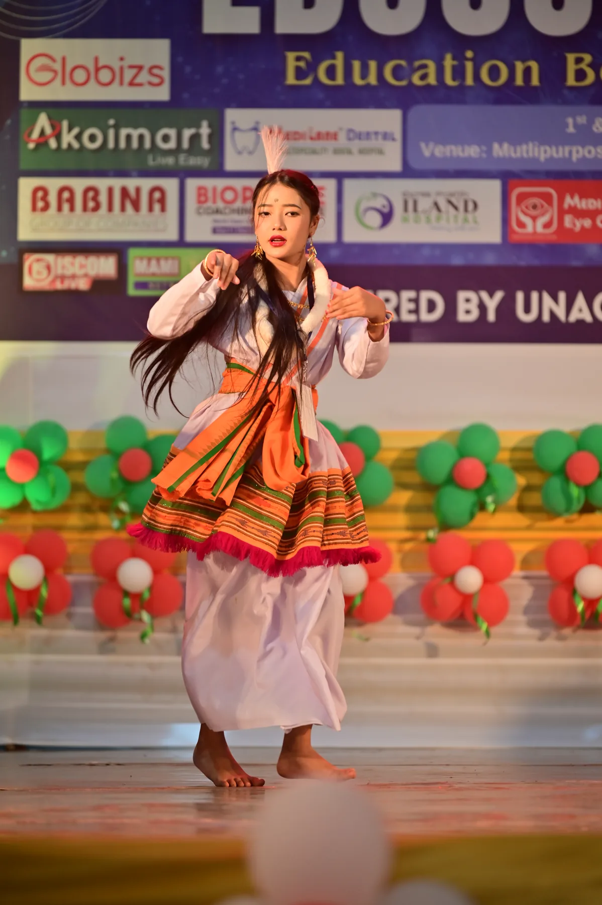 Student artistes move together in a celebration of identity.