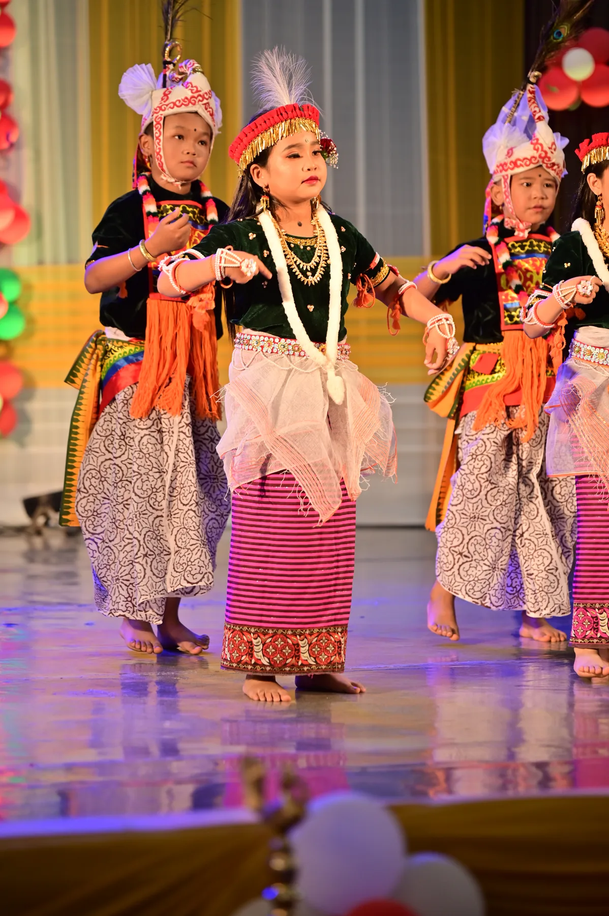 Young performers fill the arena with rhythm, colour and joy.