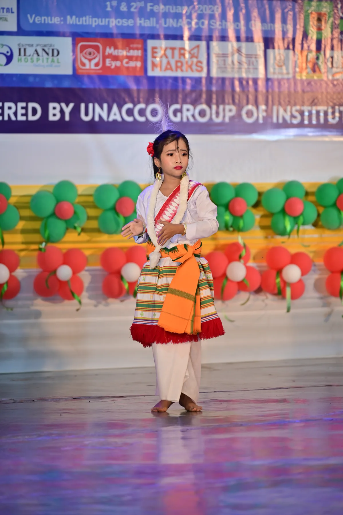 Traditional dancers fill the arena with rhythm, colour and joy.
