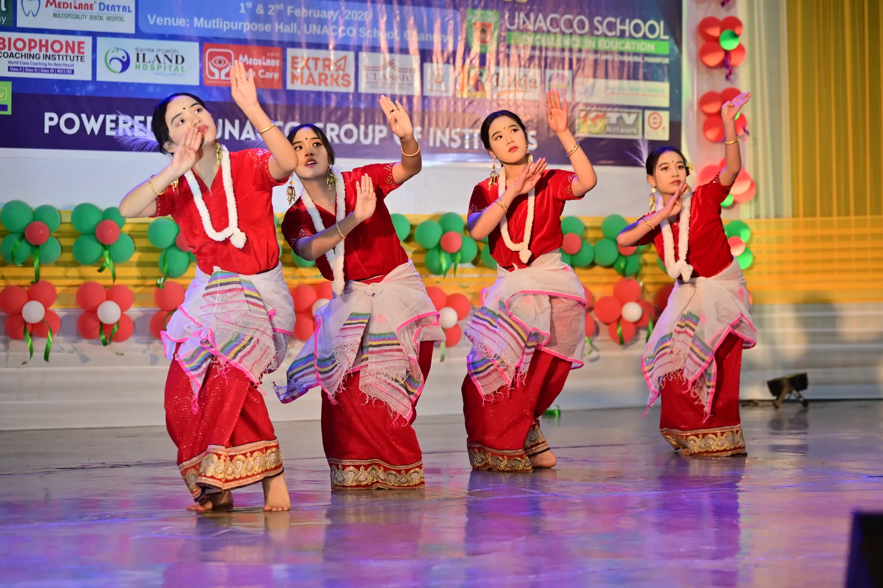 Traditional dancers honour tradition through every expressive step.