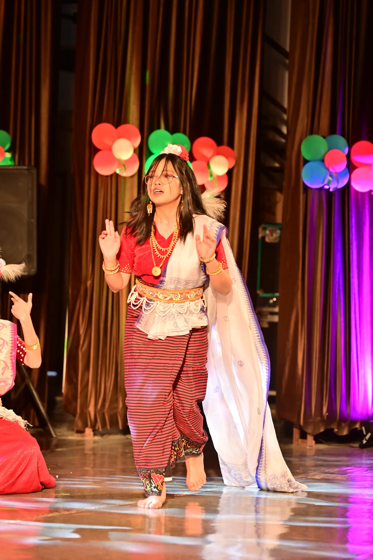 Traditional dancers connect generations through music and movement.
